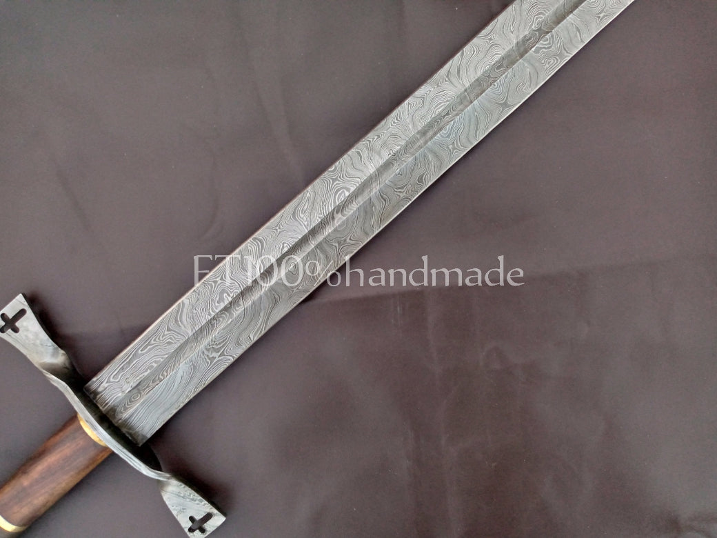 Handmade Damascus steel sword with rosewood and brass handle; leather sheath included.