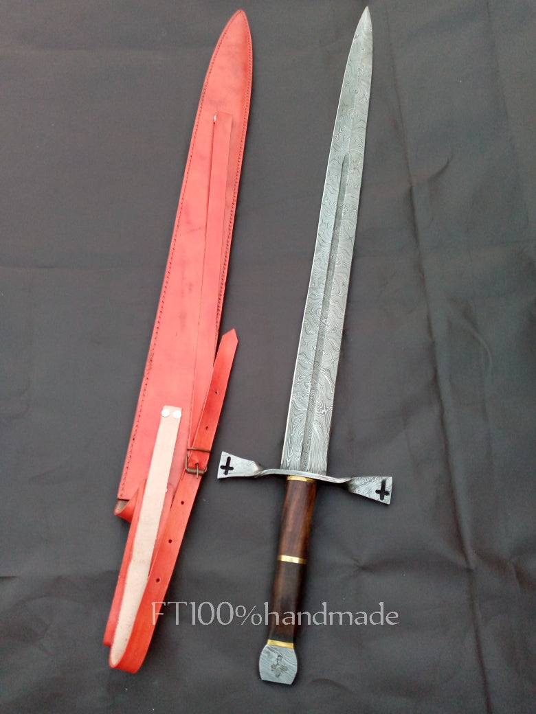 Handmade Damascus steel sword with rosewood and brass handle; leather sheath included.